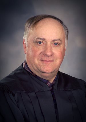 District Magistrate Judge Michael Farley